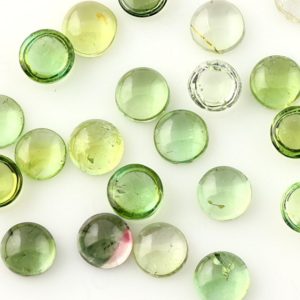 Shop Green Tourmaline Stones & Crystals! Light Green Tourmaline Cabochon 6mm Round – per stone | Natural genuine stones & crystals in various shapes & sizes. Buy raw cut, tumbled, or polished gemstones for making jewelry or crystal healing energy vibration raising reiki stones. #crystals #gemstones #crystalhealing #crystalsandgemstones #energyhealing #affiliate #ad