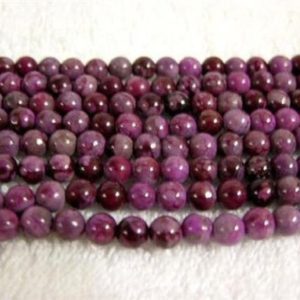 Shop Sugilite Beads! Sugilite beads round 6 mm 15 inch strand | Natural genuine round Sugilite beads for beading and jewelry making.  #jewelry #beads #beadedjewelry #diyjewelry #jewelrymaking #beadstore #beading #affiliate #ad