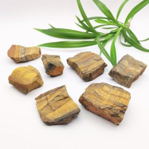 Shop Raw & Rough Tiger Eye Stones! Tiger's Eye Raw Stones Gemstone | Natural genuine stones & crystals in various shapes & sizes. Buy raw cut, tumbled, or polished gemstones for making jewelry or crystal healing energy vibration raising reiki stones. #crystals #gemstones #crystalhealing #crystalsandgemstones #energyhealing #affiliate #ad