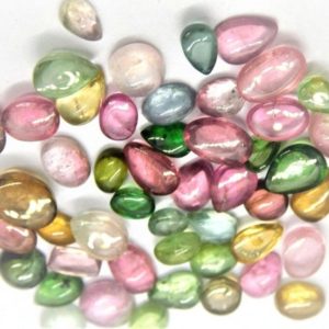 Shop Tourmaline Cabochons! Turmalin Cabochon Multicolore von 5 bis 7 mm 5 Carat (10 Stück) | Natural genuine stones & crystals in various shapes & sizes. Buy raw cut, tumbled, or polished gemstones for making jewelry or crystal healing energy vibration raising reiki stones. #crystals #gemstones #crystalhealing #crystalsandgemstones #energyhealing #affiliate #ad