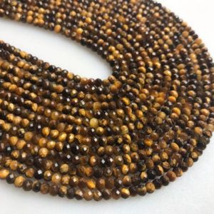 Shop Tiger Eye Rondelle Beads! Yellow Tiger Eye Faceted Rondelle Beads 2x3mm 15.5" Strand | Natural genuine rondelle Tiger Eye beads for beading and jewelry making.  #jewelry #beads #beadedjewelry #diyjewelry #jewelrymaking #beadstore #beading #affiliate #ad