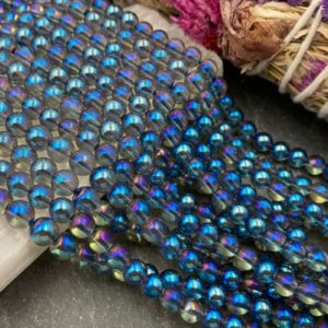Shop Angel Aura Quartz Beads! 6mm Blue Angel Aura Quartz Beads, Blue Mystic Quartz Beads, Full or Half Strand, Round, Crystal Quartz, AB, Aurora, Mystic, Aura Quartz | Natural genuine round Angel Aura Quartz beads for beading and jewelry making.  #jewelry #beads #beadedjewelry #diyjewelry #jewelrymaking #beadstore #beading #affiliate #ad