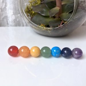 Shop Chakra Beads! 7 Chakra Bead Set, 8mm Round Crystal Beads, Chakra Crystal Set, Healing Stones, Yoga Gift, 1 each of 7 GENUINE Gemstones, 1/3" each | Shop jewelry making and beading supplies, tools & findings for DIY jewelry making and crafts. #jewelrymaking #diyjewelry #jewelrycrafts #jewelrysupplies #beading #affiliate #ad