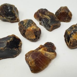 Shop Raw & Rough Amber Stones! Black Amber, Raw | Natural genuine stones & crystals in various shapes & sizes. Buy raw cut, tumbled, or polished gemstones for making jewelry or crystal healing energy vibration raising reiki stones. #crystals #gemstones #crystalhealing #crystalsandgemstones #energyhealing #affiliate #ad
