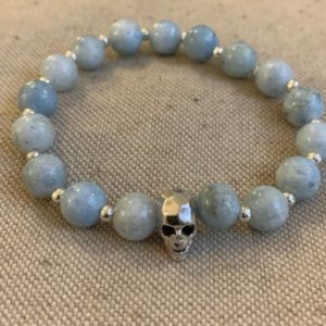 Chill out and listen to your spirit guides: Celestite stretch bracelet silver plated silver skull | Natural genuine Celestite bracelets. Buy crystal jewelry, handmade handcrafted artisan jewelry for women.  Unique handmade gift ideas. #jewelry #beadedbracelets #beadedjewelry #gift #shopping #handmadejewelry #fashion #style #product #bracelets #affiliate #ad