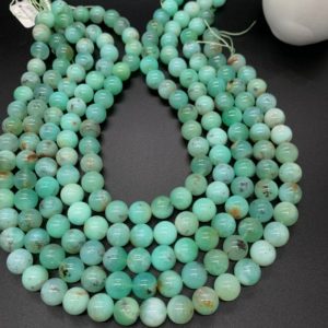 Shop Chrysoprase Round Beads! Chrysoprase Round Beads • 11 mm Size • Code #09 •  AAA quality • Length 40 Cm • Natural Chrysoprase beads • Origin Australia | Natural genuine round Chrysoprase beads for beading and jewelry making.  #jewelry #beads #beadedjewelry #diyjewelry #jewelrymaking #beadstore #beading #affiliate #ad