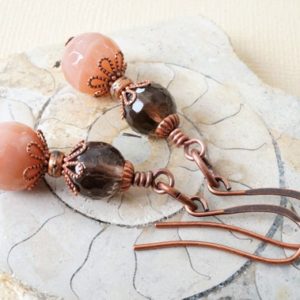 Shop Sunstone Earrings! Faceted sunstone and smoky quartz earrings, muted peach sunstone earrings, antique copper gemstone earrings, light peach and brown earrings | Natural genuine Sunstone earrings. Buy crystal jewelry, handmade handcrafted artisan jewelry for women.  Unique handmade gift ideas. #jewelry #beadedearrings #beadedjewelry #gift #shopping #handmadejewelry #fashion #style #product #earrings #affiliate #ad