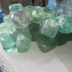 Shop Tumbled Fluorite Crystals & Pocket Stones! Fluorite Gemstone cubes, Positive energy, Self-Confidence, Decision making, Encouragement, Crystal Healing, Green Fluorite Tumble | Natural genuine stones & crystals in various shapes & sizes. Buy raw cut, tumbled, or polished gemstones for making jewelry or crystal healing energy vibration raising reiki stones. #crystals #gemstones #crystalhealing #crystalsandgemstones #energyhealing #affiliate #ad