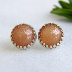 Shop Sunstone Earrings! goldsand sunstone stud earrings in sterling silver – sunstone studs – sunstone earrings – orange studs – gemstone studs – 10mm studs | Natural genuine Sunstone earrings. Buy crystal jewelry, handmade handcrafted artisan jewelry for women.  Unique handmade gift ideas. #jewelry #beadedearrings #beadedjewelry #gift #shopping #handmadejewelry #fashion #style #product #earrings #affiliate #ad