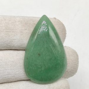 Shop Jade Cabochons! Green jade cabochon 36X23X6 MM pear shape 45ct Natural green jadeite gemstone for jewelry wire wrapping CAB001416 | Natural genuine stones & crystals in various shapes & sizes. Buy raw cut, tumbled, or polished gemstones for making jewelry or crystal healing energy vibration raising reiki stones. #crystals #gemstones #crystalhealing #crystalsandgemstones #energyhealing #affiliate #ad