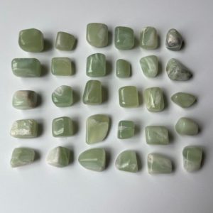 Shop Tumbled Jade Crystals & Pocket Stones! Jade Tumbled Stone // Real Burmese Jade High Quality Grade A Jade Polished Jade Crystal | Natural genuine stones & crystals in various shapes & sizes. Buy raw cut, tumbled, or polished gemstones for making jewelry or crystal healing energy vibration raising reiki stones. #crystals #gemstones #crystalhealing #crystalsandgemstones #energyhealing #affiliate #ad