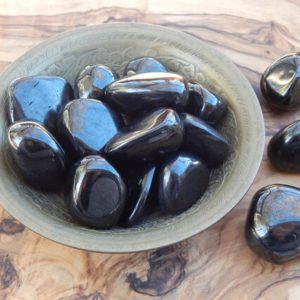 Shop Jet Stones & Crystals! Jet Tumbled Stone | Natural genuine stones & crystals in various shapes & sizes. Buy raw cut, tumbled, or polished gemstones for making jewelry or crystal healing energy vibration raising reiki stones. #crystals #gemstones #crystalhealing #crystalsandgemstones #energyhealing #affiliate #ad