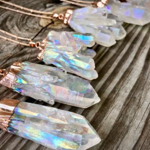 Large rainbow quartz necklace Raw crystal necklace Angel Aura quartz necklace Healing crystal necklace for women Rose Gold crystal necklace | Natural genuine Angel Aura Quartz necklaces. Buy crystal jewelry, handmade handcrafted artisan jewelry for women.  Unique handmade gift ideas. #jewelry #beadednecklaces #beadedjewelry #gift #shopping #handmadejewelry #fashion #style #product #necklaces #affiliate #ad