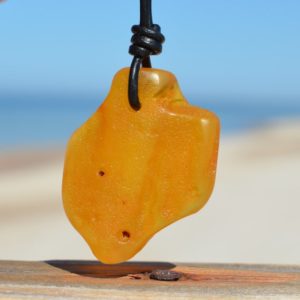 Shop Amber Pendants! Large Unpolished Amber Pendant/ Pure Baltic Amber/ Raw Amber Amulet/ Bernstein Kette Man/ Gift for Men orWomen | Natural genuine Amber pendants. Buy handcrafted artisan men's jewelry, gifts for men.  Unique handmade mens fashion accessories. #jewelry #beadedpendants #beadedjewelry #shopping #gift #handmadejewelry #pendants #affiliate #ad