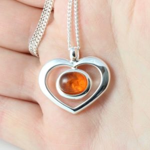 Shop Amber Pendants! Natural Amber cabochon heart pendant | Natural genuine Amber pendants. Buy crystal jewelry, handmade handcrafted artisan jewelry for women.  Unique handmade gift ideas. #jewelry #beadedpendants #beadedjewelry #gift #shopping #handmadejewelry #fashion #style #product #pendants #affiliate #ad
