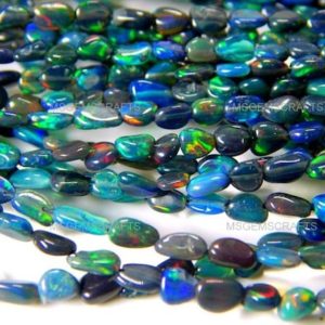 Shop Opal Chip & Nugget Beads! Natural Black Ethiopian Opal Nugget Beads, Flashy Opal Tumble Beads 3×6 To 5×7 mm Fair Opal Smooth Nugget Shape Beads 17 Inches | Natural genuine chip Opal beads for beading and jewelry making.  #jewelry #beads #beadedjewelry #diyjewelry #jewelrymaking #beadstore #beading #affiliate #ad