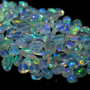 Shop Opal Chip & Nugget Beads! Natural Ethiopian Opal-Cabochon Opal Tumble Beads-Loose Opal Tumble-Wholesale Opal Beads Lot-Blue Fire Opal Tumble Beads-6-8 MM Opal Tumble | Natural genuine chip Opal beads for beading and jewelry making.  #jewelry #beads #beadedjewelry #diyjewelry #jewelrymaking #beadstore #beading #affiliate #ad