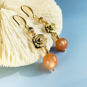 Shop Sunstone Earrings! Natural Sunstone Earrings | Crystal Dangle Earrings with Gold Charm | Natural genuine Sunstone earrings. Buy crystal jewelry, handmade handcrafted artisan jewelry for women.  Unique handmade gift ideas. #jewelry #beadedearrings #beadedjewelry #gift #shopping #handmadejewelry #fashion #style #product #earrings #affiliate #ad
