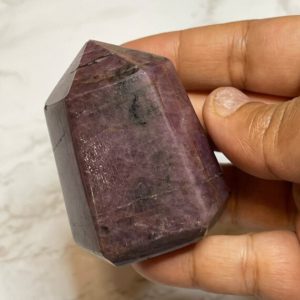 Shop Ruby Points & Wands! One 100% genuine Ruby Point | Natural genuine stones & crystals in various shapes & sizes. Buy raw cut, tumbled, or polished gemstones for making jewelry or crystal healing energy vibration raising reiki stones. #crystals #gemstones #crystalhealing #crystalsandgemstones #energyhealing #affiliate #ad