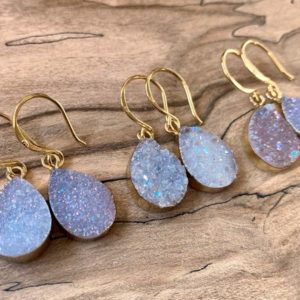 Shop Angel Aura Quartz Earrings! Raw druzy earrings Angel aura earrings Raw druzy jewelry Druzy geode earrings dangle drusy earrings Angel aura quartz earrings Bridesmaid | Natural genuine Angel Aura Quartz earrings. Buy crystal jewelry, handmade handcrafted artisan jewelry for women.  Unique handmade gift ideas. #jewelry #beadedearrings #beadedjewelry #gift #shopping #handmadejewelry #fashion #style #product #earrings #affiliate #ad