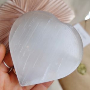 Shop Selenite Shapes! Satin Spar Selenite Heart ~ Large Satin Spar Selenite Heart | Natural genuine stones & crystals in various shapes & sizes. Buy raw cut, tumbled, or polished gemstones for making jewelry or crystal healing energy vibration raising reiki stones. #crystals #gemstones #crystalhealing #crystalsandgemstones #energyhealing #affiliate #ad