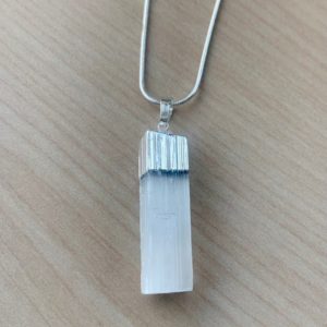 Shop Selenite Pendants! Selenite pendant with chain | Natural genuine Selenite pendants. Buy crystal jewelry, handmade handcrafted artisan jewelry for women.  Unique handmade gift ideas. #jewelry #beadedpendants #beadedjewelry #gift #shopping #handmadejewelry #fashion #style #product #pendants #affiliate #ad