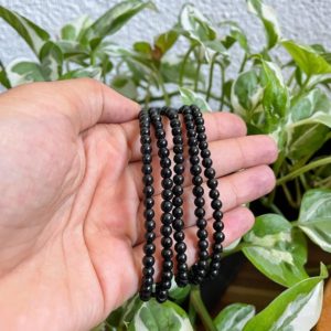 Shungite Bracelet | fair trade & ethical | Gemstone Jewelry, Black Healing Stone, Crystal Beads, Protection Stone | spiritual gifts | Natural genuine Array bracelets. Buy crystal jewelry, handmade handcrafted artisan jewelry for women.  Unique handmade gift ideas. #jewelry #beadedbracelets #beadedjewelry #gift #shopping #handmadejewelry #fashion #style #product #bracelets #affiliate #ad