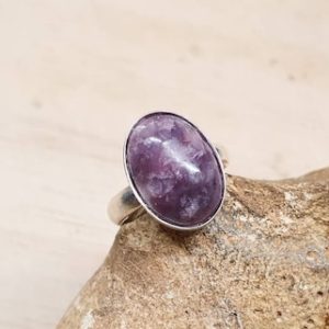 Shop Lepidolite Rings! Simple oval purple Lepidolite ring. Sterling silver Reiki jewelry. Libra jewelry. Purple gemstone statement rings for women. 14x10mm stone | Natural genuine Lepidolite rings, simple unique handcrafted gemstone rings. #rings #jewelry #shopping #gift #handmade #fashion #style #affiliate #ad