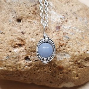 Shop Angelite Pendants! Tiny Blue Angelite pendant. Reiki jewelry uk. Oval frame pendant. | Natural genuine Angelite pendants. Buy crystal jewelry, handmade handcrafted artisan jewelry for women.  Unique handmade gift ideas. #jewelry #beadedpendants #beadedjewelry #gift #shopping #handmadejewelry #fashion #style #product #pendants #affiliate #ad