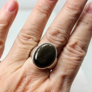 Shop Golden Obsidian Rings! Unisex ring… black obsidian stone with golden sheen oval shape cab of natural golden sheen black Obsidian stone set on 925 sterling silver | Natural genuine Golden Obsidian rings, simple unique handcrafted gemstone rings. #rings #jewelry #shopping #gift #handmade #fashion #style #affiliate #ad