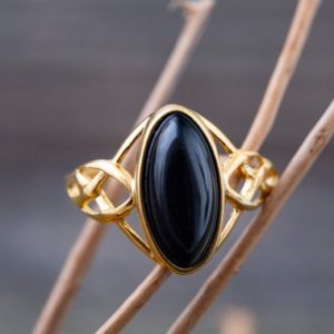 Whitby jet ring. Whitby jet & gold. Unique ring. Celtic design. Artistic jewelry. Designer ring. Perfect gift. Elegant ring. Genuine jet. | Natural genuine Jet rings, simple unique handcrafted gemstone rings. #rings #jewelry #shopping #gift #handmade #fashion #style #affiliate #ad