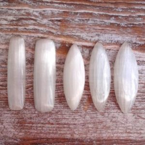 Shop Selenite Cabochons! White Selenite cabochon, marquise cabochon, natural white cabochon | Natural genuine stones & crystals in various shapes & sizes. Buy raw cut, tumbled, or polished gemstones for making jewelry or crystal healing energy vibration raising reiki stones. #crystals #gemstones #crystalhealing #crystalsandgemstones #energyhealing #affiliate #ad