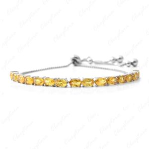 Shop Yellow Sapphire Bracelets! Yellow Sapphire Bolo Bracelet, Oval cut Sapphire Chain Link Bracelet, Unique Bridal Anniversary Beaded Charm Bracelet gifts for Mother Wife | Natural genuine Yellow Sapphire bracelets. Buy handcrafted artisan wedding jewelry.  Unique handmade bridal jewelry gift ideas. #jewelry #beadedbracelets #gift #crystaljewelry #shopping #handmadejewelry #wedding #bridal #bracelets #affiliate #ad