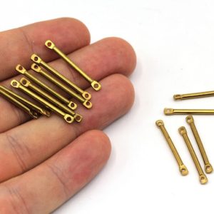Shop Jewelry Connectors! 2x25mm Raw Brass Stick Bar Charm, Bar Connector, 2 Holes Bar Charm, Bar Earrings, Earring Pendants, Earring Findings, Brass Findings, BM462 | Shop jewelry making and beading supplies, tools & findings for DIY jewelry making and crafts. #jewelrymaking #diyjewelry #jewelrycrafts #jewelrysupplies #beading #affiliate #ad