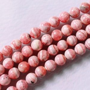 Shop Rhodochrosite Round Beads! AAA Rhodochrosite Round Beads, 4mm 6mm 8mm 10mm 12mm Rhodochrosite Beads, 15 inch per strand | Natural genuine round Rhodochrosite beads for beading and jewelry making.  #jewelry #beads #beadedjewelry #diyjewelry #jewelrymaking #beadstore #beading #affiliate #ad