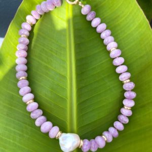 Shop Kunzite Necklaces! Chunky kunzite rondelle beaded necklace with baroque pearl in the middle | Natural genuine Kunzite necklaces. Buy crystal jewelry, handmade handcrafted artisan jewelry for women.  Unique handmade gift ideas. #jewelry #beadednecklaces #beadedjewelry #gift #shopping #handmadejewelry #fashion #style #product #necklaces #affiliate #ad