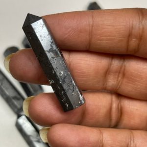 Shop Hematite Points & Wands! Hematite  points – one | Natural genuine stones & crystals in various shapes & sizes. Buy raw cut, tumbled, or polished gemstones for making jewelry or crystal healing energy vibration raising reiki stones. #crystals #gemstones #crystalhealing #crystalsandgemstones #energyhealing #affiliate #ad
