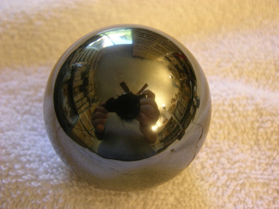 Hematite Sphere Hand Carved Polished 1.5 Inch + Acrylic Ring Stand