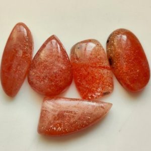 Shop Sunstone Cabochons! LOOSE SUNSTONE GEMSTONE Mix Shape 41Ct Good Quality Natural Sunstone Cabochon Gemstone Sun Fire Sunstone Ring Size 5Pcs Lot Jewelry | Natural genuine stones & crystals in various shapes & sizes. Buy raw cut, tumbled, or polished gemstones for making jewelry or crystal healing energy vibration raising reiki stones. #crystals #gemstones #crystalhealing #crystalsandgemstones #energyhealing #affiliate #ad
