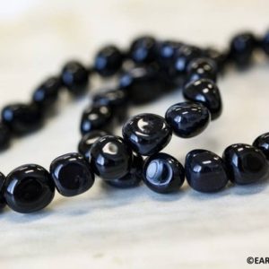 M / Black Onyx 10-12mm Tumbled Nugget Beads 16″ Strand Dyed Black Agate Size Varies For Jewelry Making | Natural genuine beads Gemstone beads for beading and jewelry making.  #jewelry #beads #beadedjewelry #diyjewelry #jewelrymaking #beadstore #beading #affiliate #ad