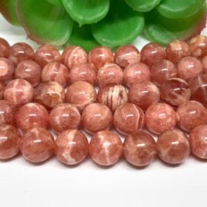 Shop Rhodochrosite Round Beads! Rhodocrosite 7mm Rhodochrosite Round Beads, Length 40mm, Good Quality- Rhodochrosite Beads | Natural genuine round Rhodochrosite beads for beading and jewelry making.  #jewelry #beads #beadedjewelry #diyjewelry #jewelrymaking #beadstore #beading #affiliate #ad