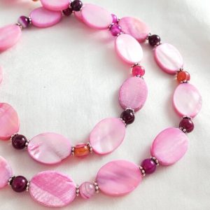 Shop Agate Necklaces! Bright magenta / hot pink mother of pearl ovals & striped agate long necklace. Fuschia banded gemstones and shells. | Natural genuine Agate necklaces. Buy crystal jewelry, handmade handcrafted artisan jewelry for women.  Unique handmade gift ideas. #jewelry #beadednecklaces #beadedjewelry #gift #shopping #handmadejewelry #fashion #style #product #necklaces #affiliate #ad