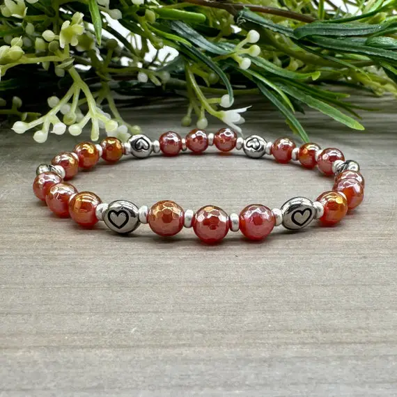 Courageous Heart Bracelet | Genuine Electroplated Faceted Carnelian Gemstone Bead Stretch Bracelet With Heart Accent Beads