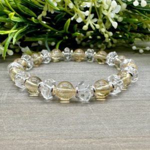 Shop Citrine Bracelets! Joy and Warmth Bracelet | Genuine Citrine and Faceted Clear Quartz  Natural Crystal Gemstone 8 mm Bead Stretch Bracelet | Natural genuine Citrine bracelets. Buy crystal jewelry, handmade handcrafted artisan jewelry for women.  Unique handmade gift ideas. #jewelry #beadedbracelets #beadedjewelry #gift #shopping #handmadejewelry #fashion #style #product #bracelets #affiliate #ad