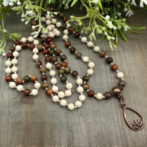 Shop Jasper Necklaces! Picasso Jasper and River Stone Hand Knotted 108 Stone Mala Meditation Necklace | 38 inches | silk cord | 6 mm genuine stones | Natural genuine Jasper necklaces. Buy crystal jewelry, handmade handcrafted artisan jewelry for women.  Unique handmade gift ideas. #jewelry #beadednecklaces #beadedjewelry #gift #shopping #handmadejewelry #fashion #style #product #necklaces #affiliate #ad