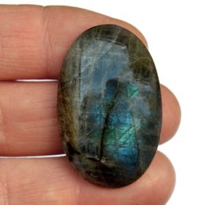 Shop Labradorite Cabochons! Blue Labradorite Cabochon Stone (37mm x 23mm x 7mm) – Oval Gemstone – Natural Blue Labradorite | Natural genuine stones & crystals in various shapes & sizes. Buy raw cut, tumbled, or polished gemstones for making jewelry or crystal healing energy vibration raising reiki stones. #crystals #gemstones #crystalhealing #crystalsandgemstones #energyhealing #affiliate #ad