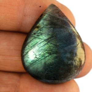 Shop Labradorite Cabochons! Labradorite Cabochon Stone (30mm x 24mm x 5mm) – Drop Cabochon – Teardrop Gemstone | Natural genuine stones & crystals in various shapes & sizes. Buy raw cut, tumbled, or polished gemstones for making jewelry or crystal healing energy vibration raising reiki stones. #crystals #gemstones #crystalhealing #crystalsandgemstones #energyhealing #affiliate #ad