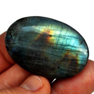 Shop Labradorite Cabochons! Labradorite Cabochon Stone (41mm x 27mm x 7mm) – Large Oval Gemstone – Loose Crystal | Natural genuine stones & crystals in various shapes & sizes. Buy raw cut, tumbled, or polished gemstones for making jewelry or crystal healing energy vibration raising reiki stones. #crystals #gemstones #crystalhealing #crystalsandgemstones #energyhealing #affiliate #ad