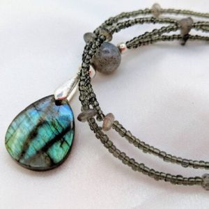 Shop Labradorite Pendants! Ultra long blue/green Labradorite & silver necklace. Top color Labradorite pendant. Gray with blue flash jewelry. Teardrop pendant | Natural genuine Labradorite pendants. Buy crystal jewelry, handmade handcrafted artisan jewelry for women.  Unique handmade gift ideas. #jewelry #beadedpendants #beadedjewelry #gift #shopping #handmadejewelry #fashion #style #product #pendants #affiliate #ad
