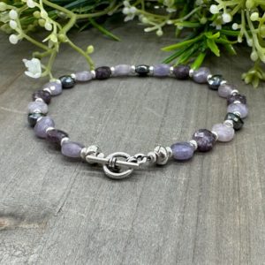 Shop Lepidolite Bracelets! Energy and Change Bracelet | Genuine Lepidolite and Terahertz Faceted Coin Bead Bracelet with Toggle Clasp | Natural genuine Lepidolite bracelets. Buy crystal jewelry, handmade handcrafted artisan jewelry for women.  Unique handmade gift ideas. #jewelry #beadedbracelets #beadedjewelry #gift #shopping #handmadejewelry #fashion #style #product #bracelets #affiliate #ad